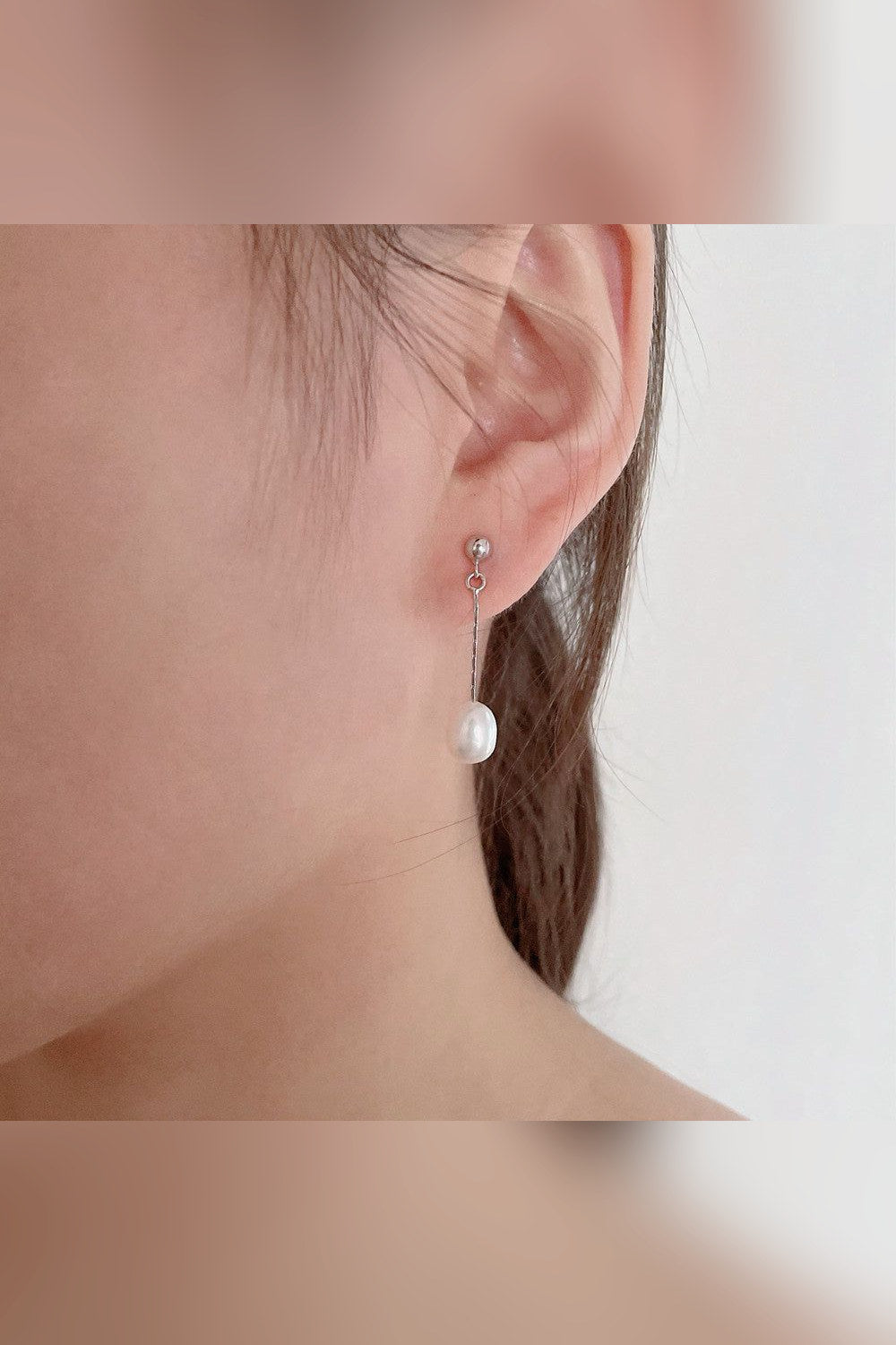 Pendientes largos de perla en plateado