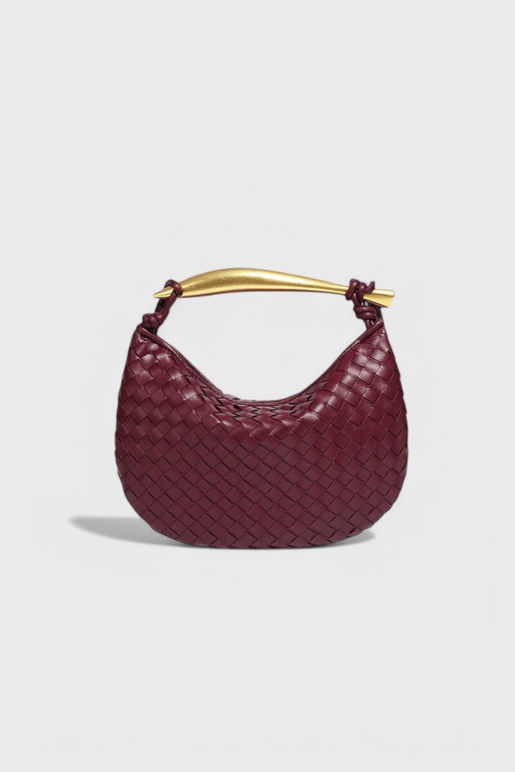 Bolso trenzado Gerda con asa metálica en rojo vino