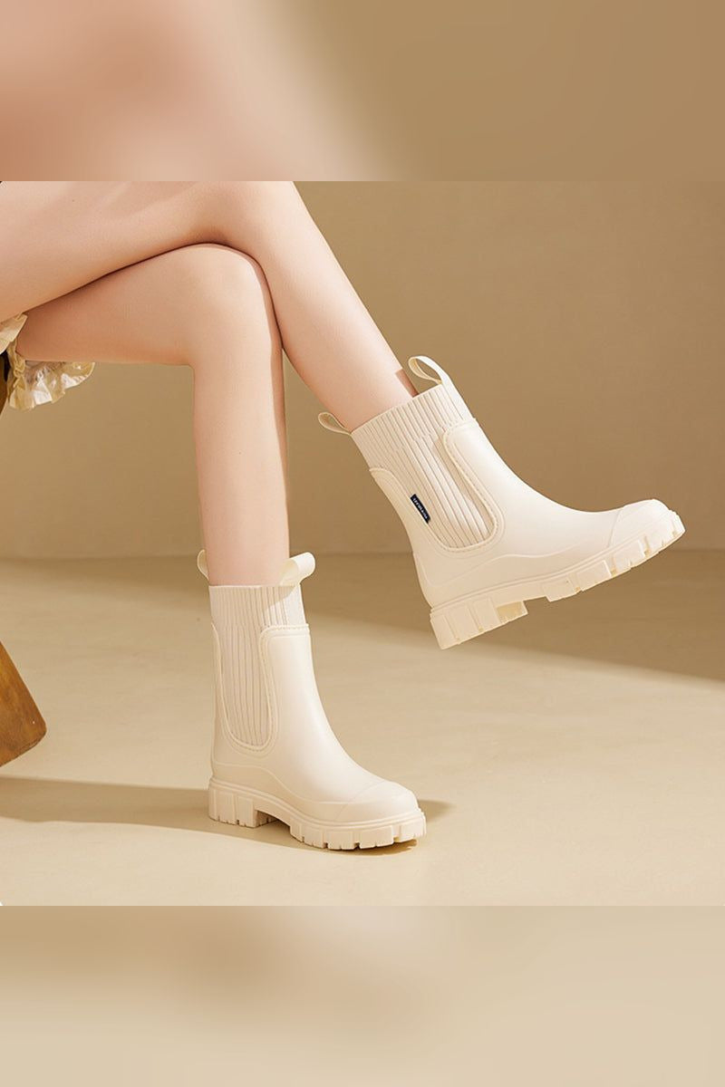 Botas impermeables de media caña en crema