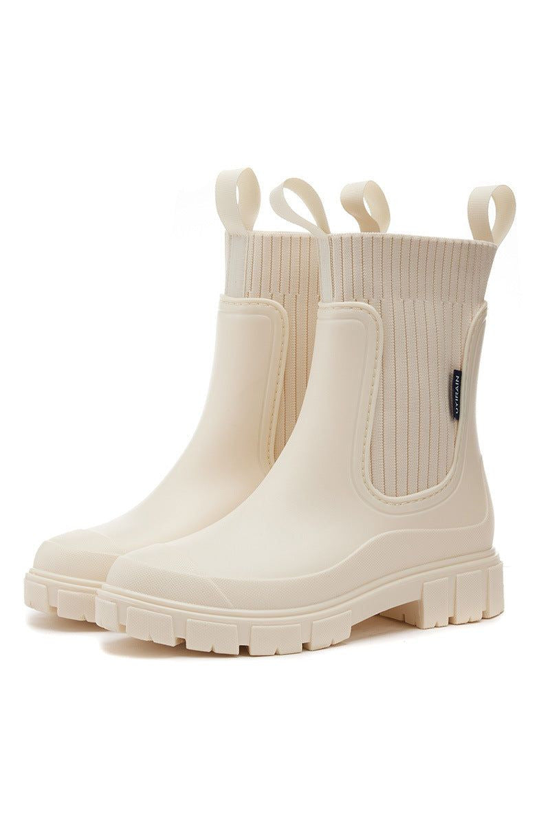 Botas impermeables de media caña en crema