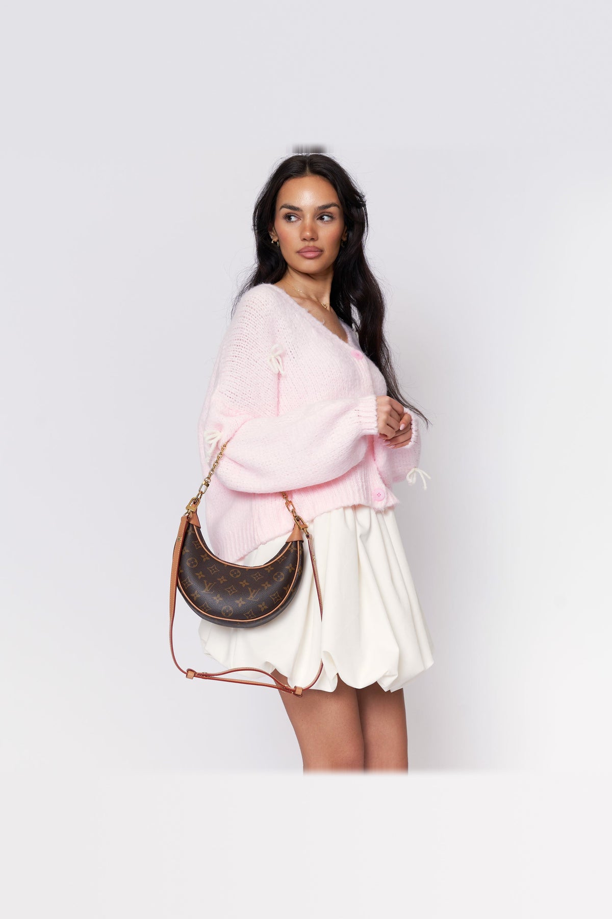 Cárdigan oversize con lacitos en rosa empolvado con lazos blancos