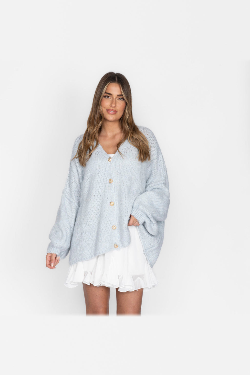 Cárdigan oversize de punto con escote de pico en azul hielo