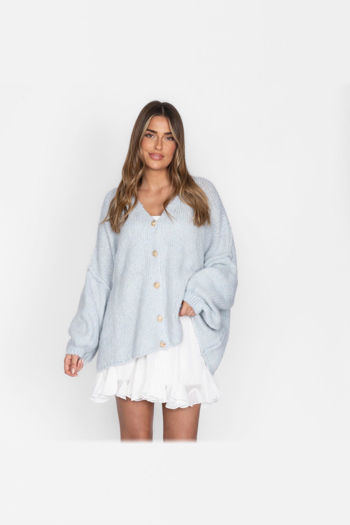 Cárdigan oversize de punto con escote de pico en azul hielo