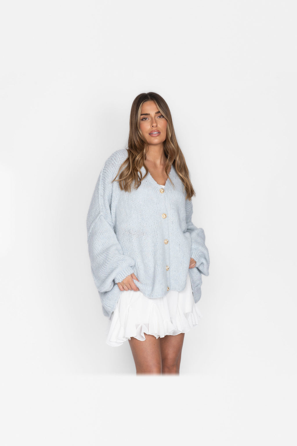 Cárdigan oversize de punto con escote de pico en azul hielo