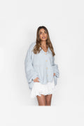 Cárdigan oversize de punto con escote de pico en azul hielo