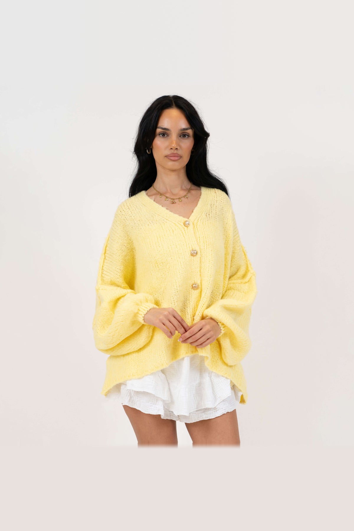 Cárdigan oversize de punto con escote de pico en amarillo claro