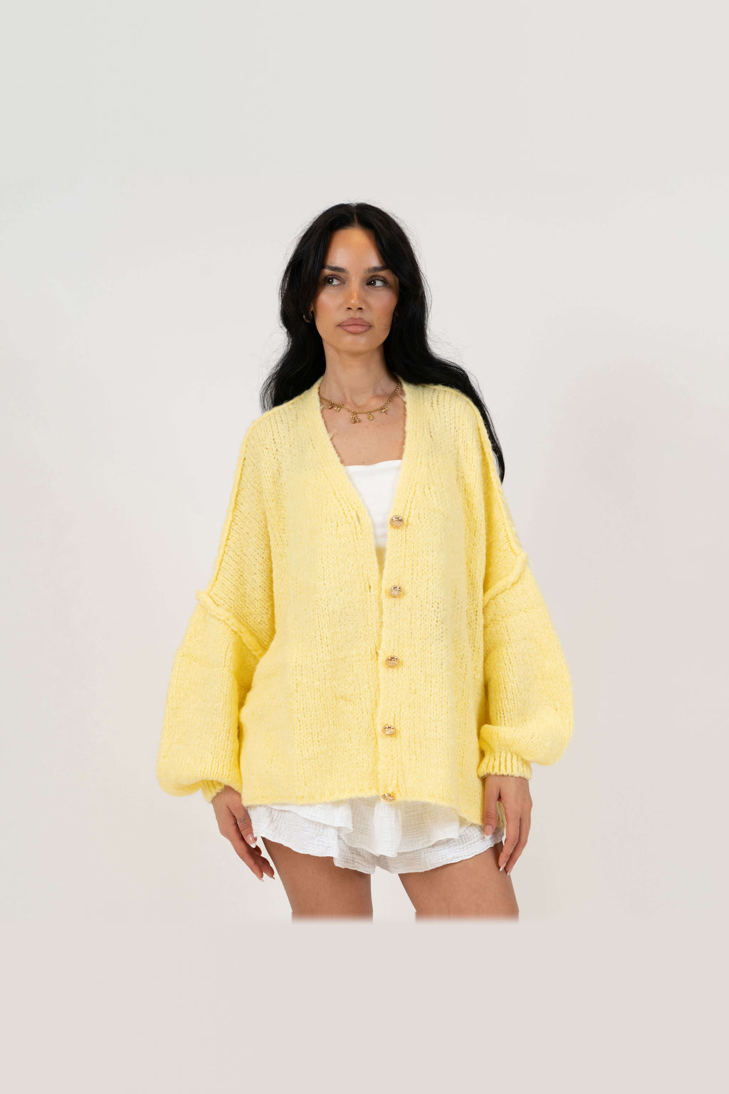 Cárdigan oversize de punto con escote de pico en amarillo claro