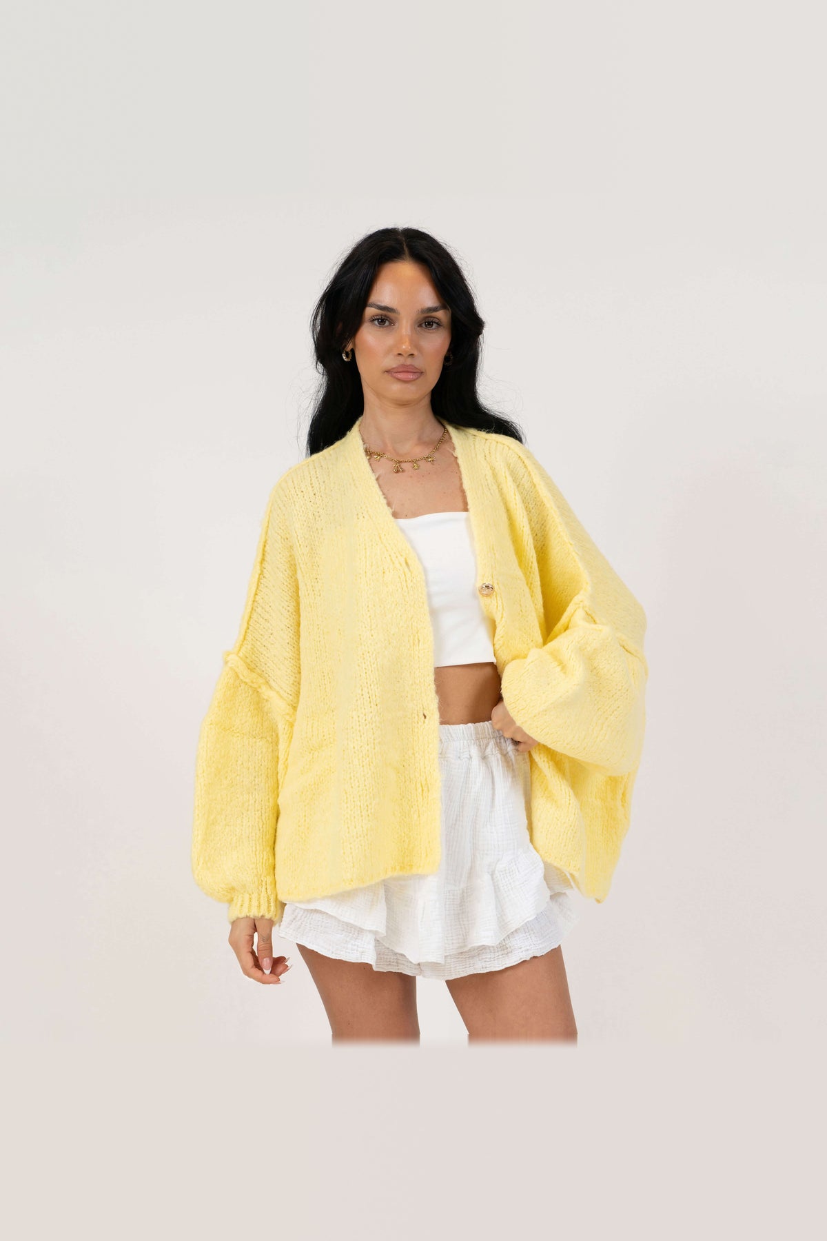 Cárdigan oversize de punto con escote de pico en amarillo claro