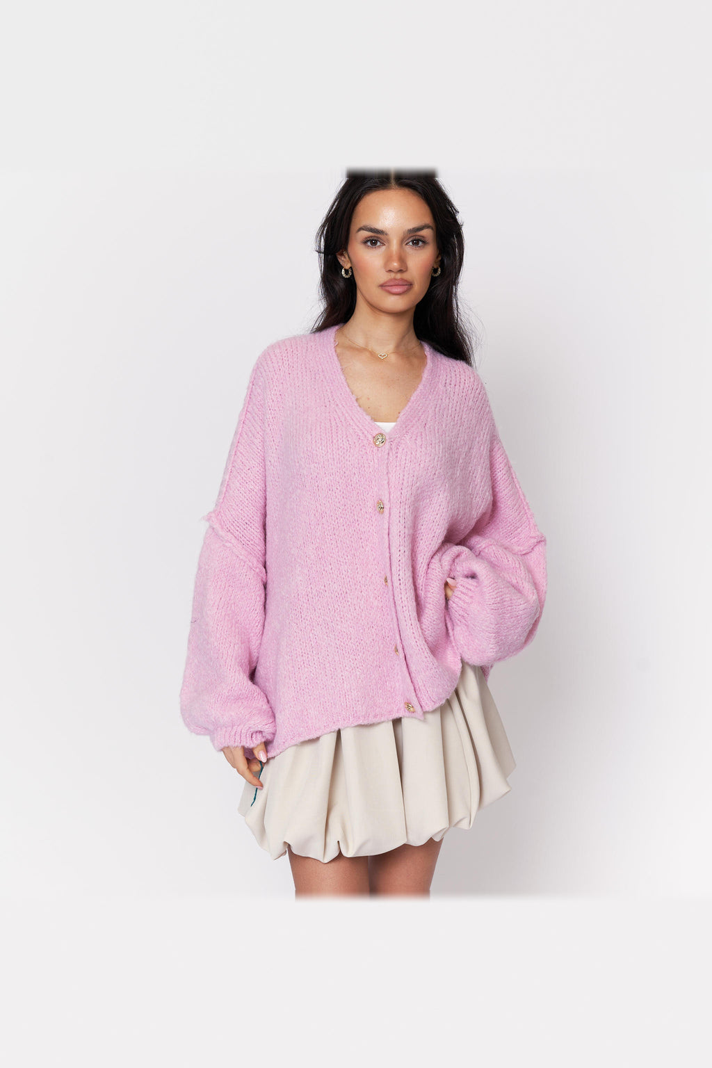 Cárdigan oversize de punto con escote de pico en rosa