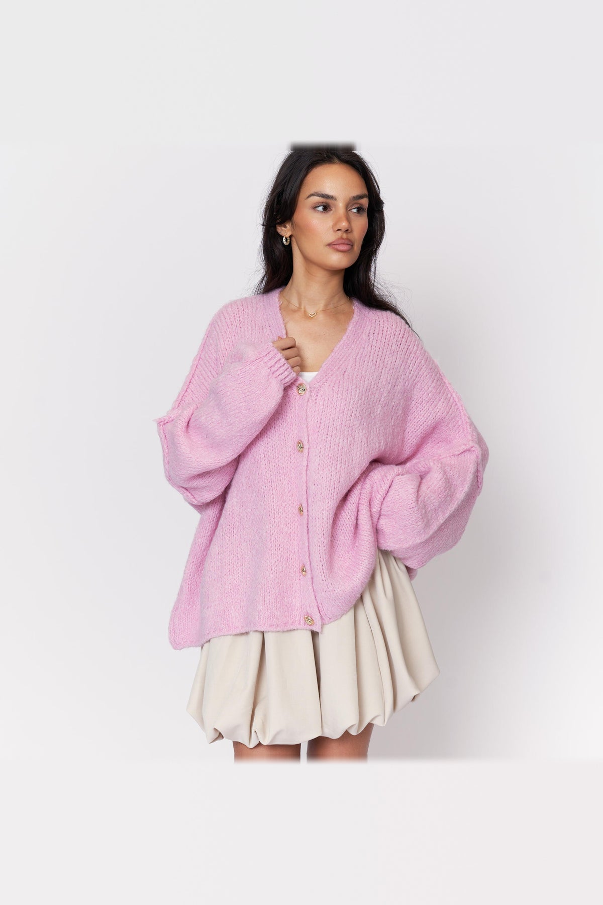 Cárdigan oversize de punto con escote de pico en rosa