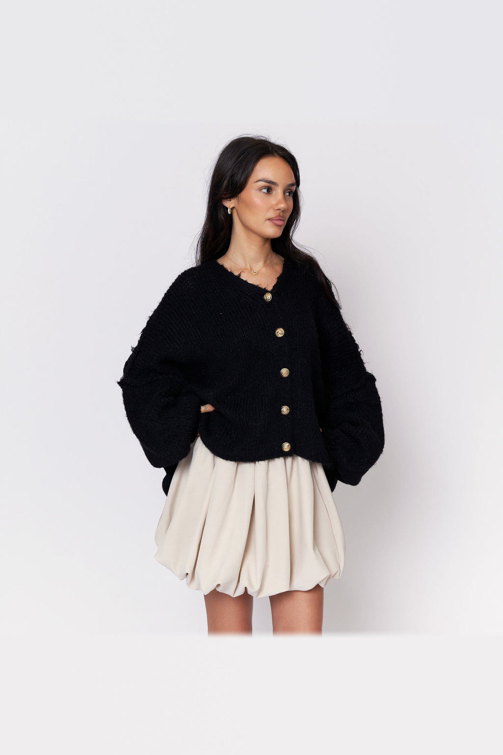 Cárdigan oversize de punto con escote de pico en negro