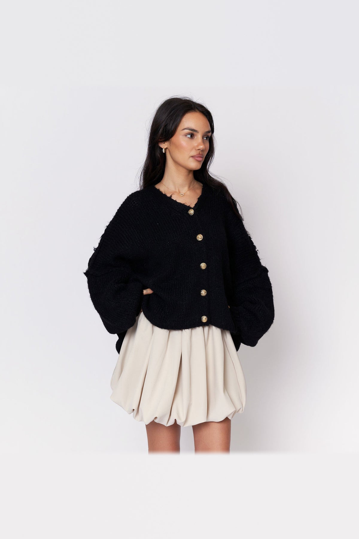 Cárdigan oversize de punto con escote de pico en negro