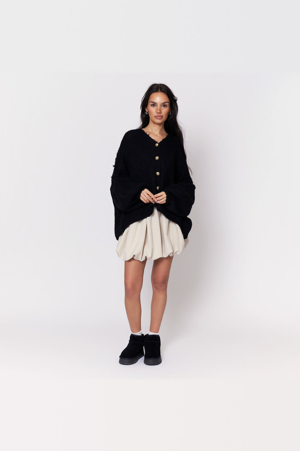 Cárdigan oversize de punto con escote de pico en negro