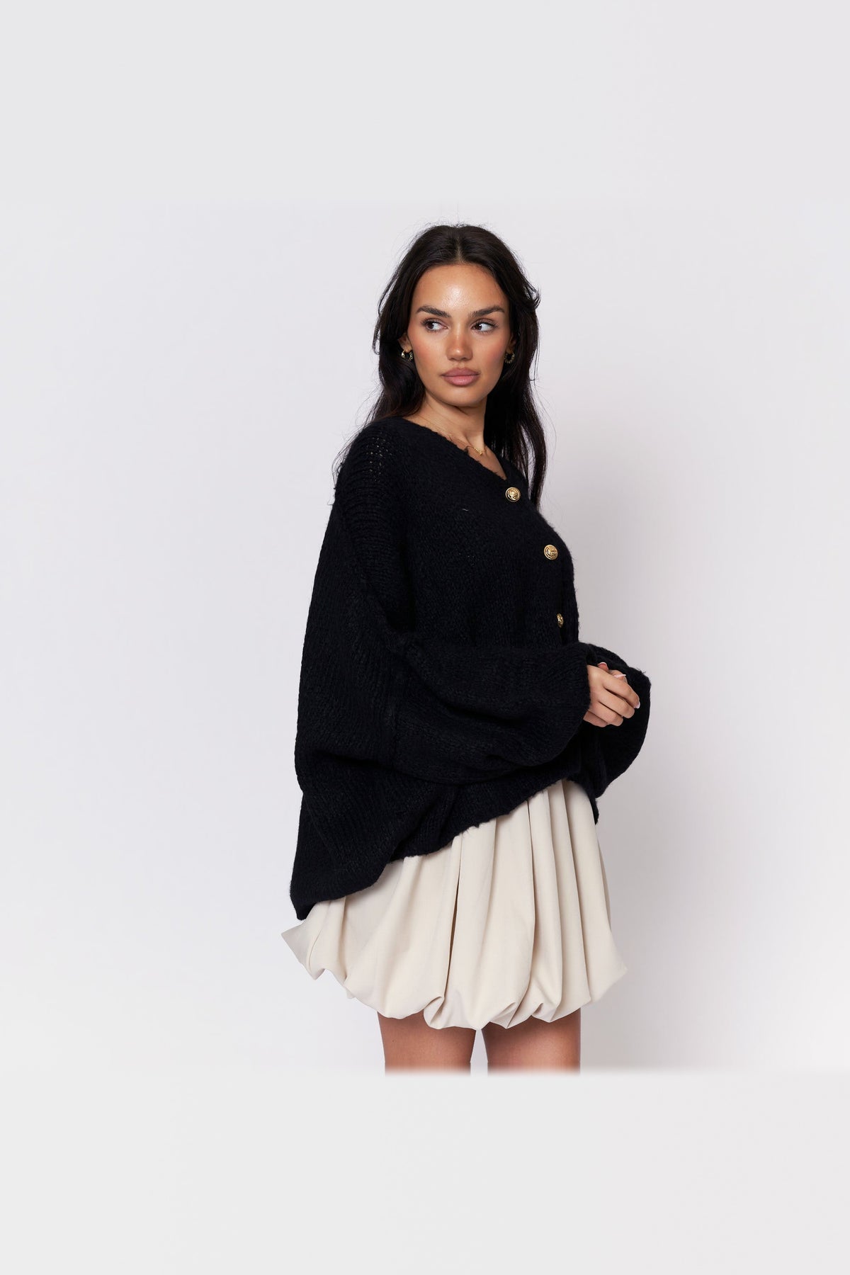 Cárdigan oversize de punto con escote de pico en negro
