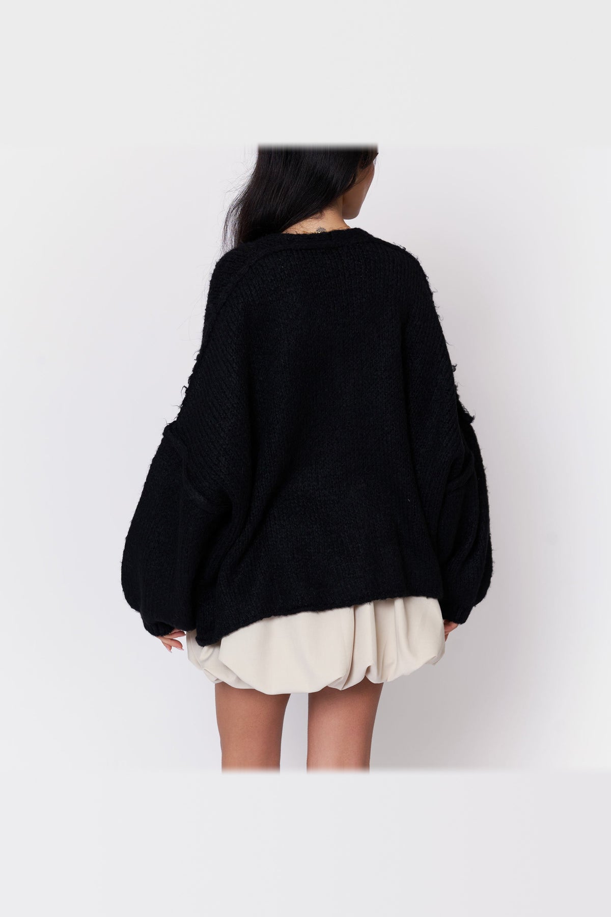 Cárdigan oversize de punto con escote de pico en negro