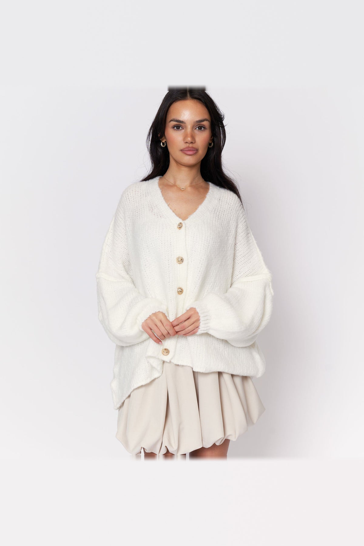 Cárdigan oversize de punto con escote de pico en blanco