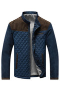 Chaqueta acolchada de rombos con mangas de pana en azul marino y marrón