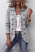 Chaqueta de punto gris jaspeado con volantes en gris jaspeado