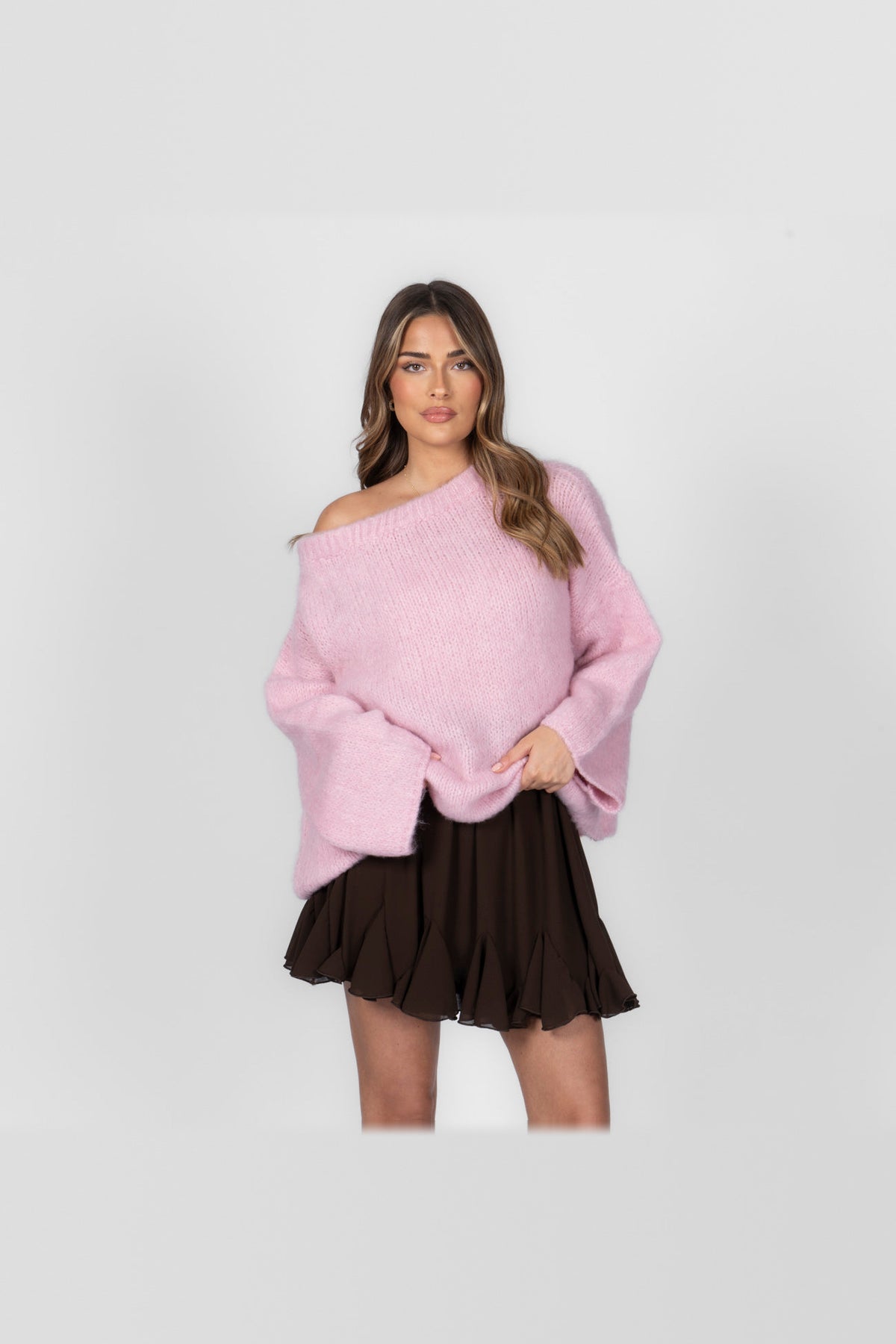 Jersey de punto con hombros al aire en rosa