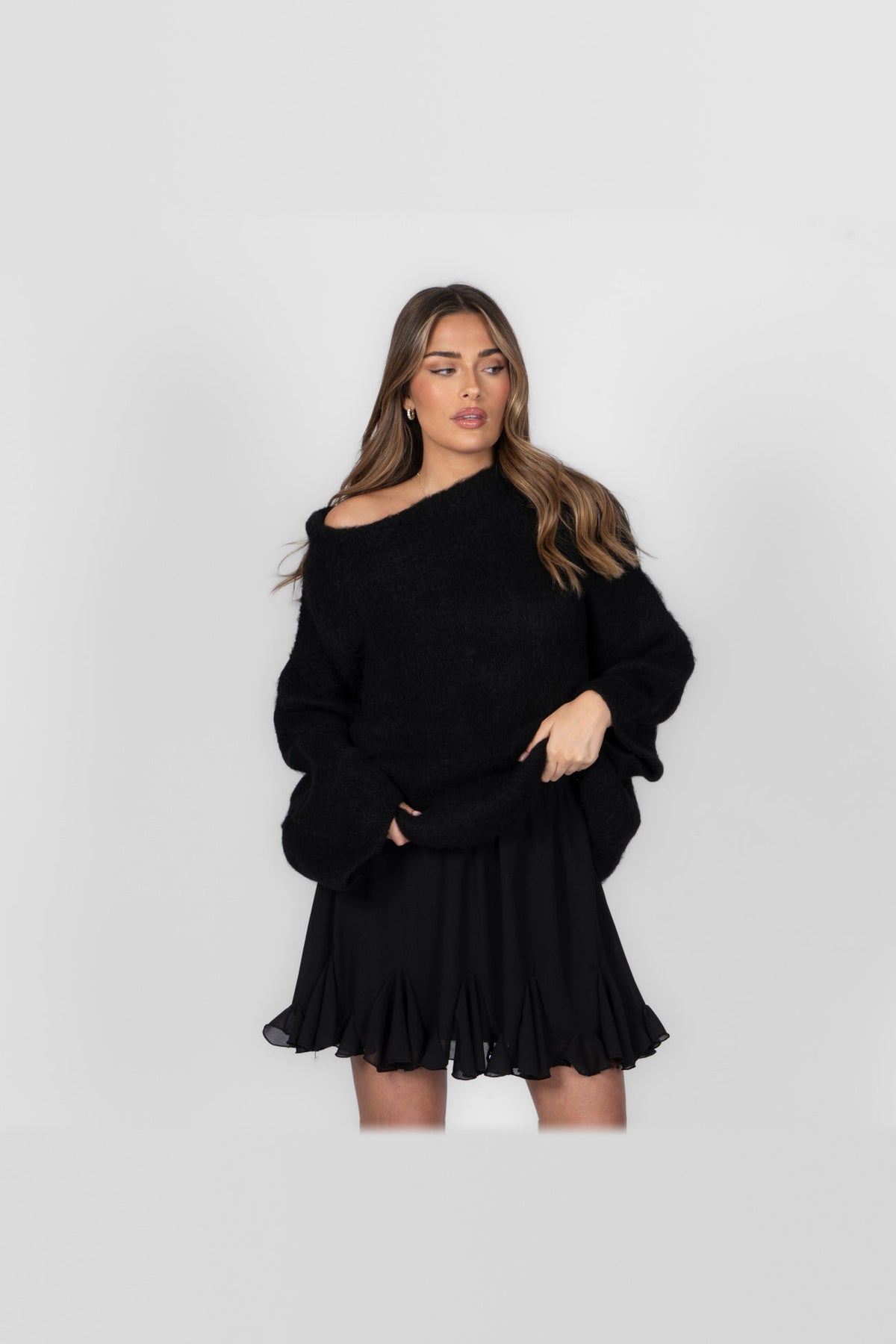 Jersey de punto con hombros al aire en negro