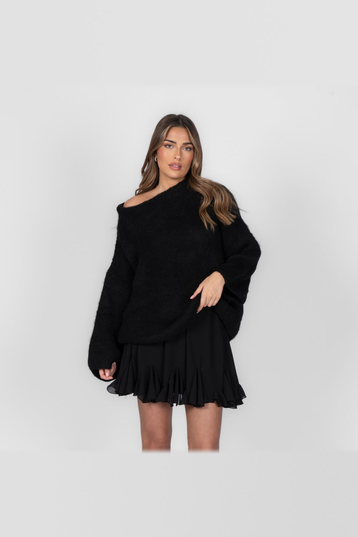 Jersey de punto con hombros al aire en negro