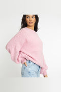 Jersey oversize de cuello redondo en rosa