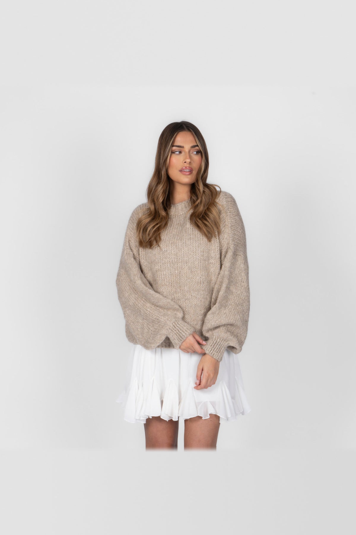 Jersey oversize de cuello redondo en beige