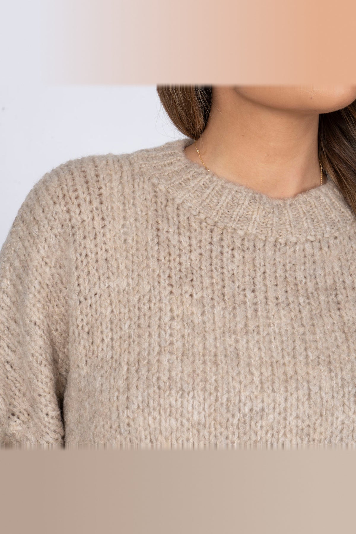 Jersey oversize de cuello redondo en beige