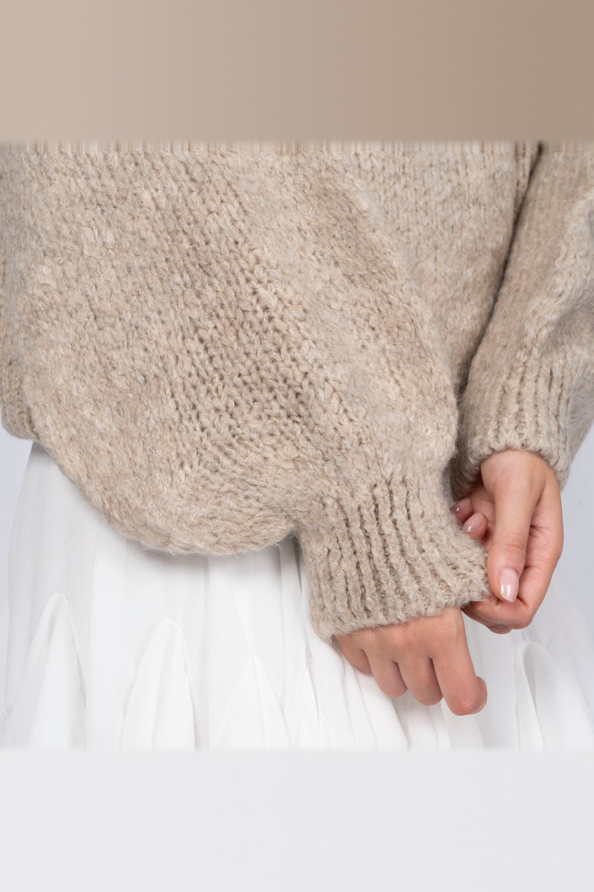 Jersey oversize de cuello redondo en beige