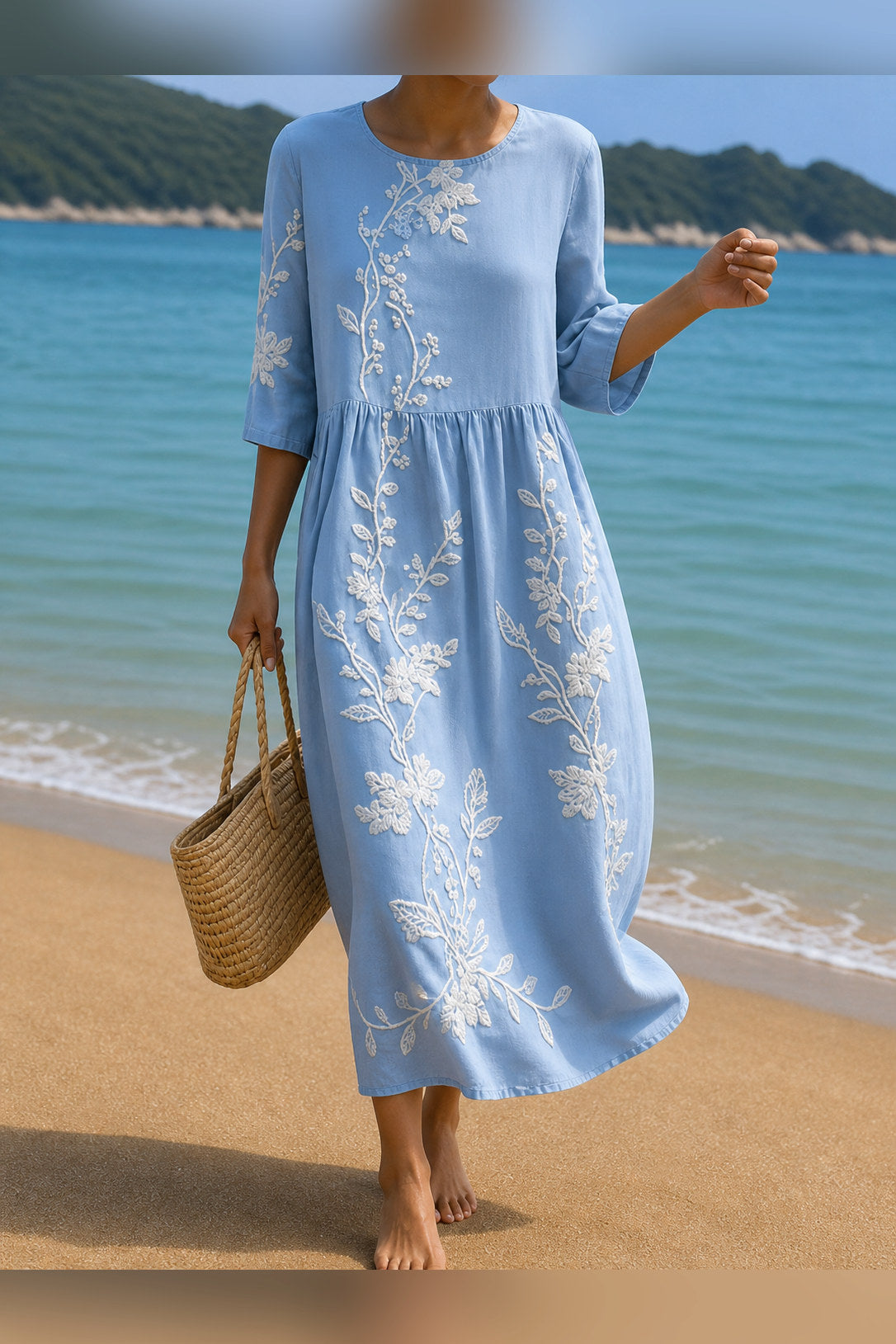 Vestido midi con flores bordadas