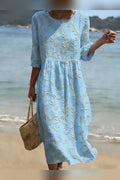 Vestido midi azul con bordado en azul