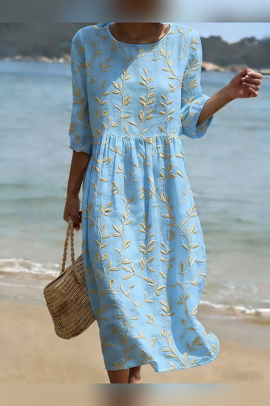 Vestido midi azul con bordado en azul