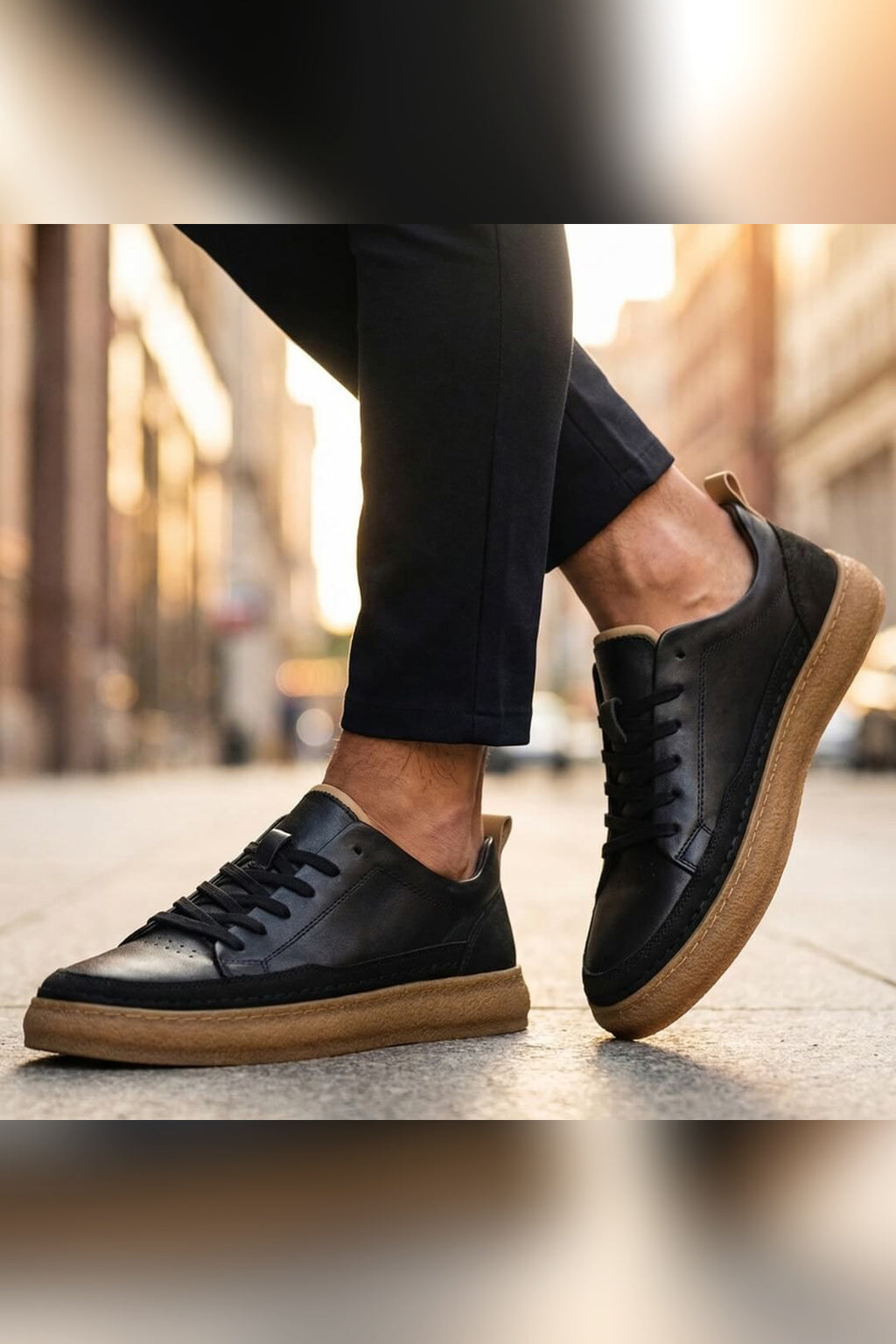 Zapatilla de piel cosida a mano en negro