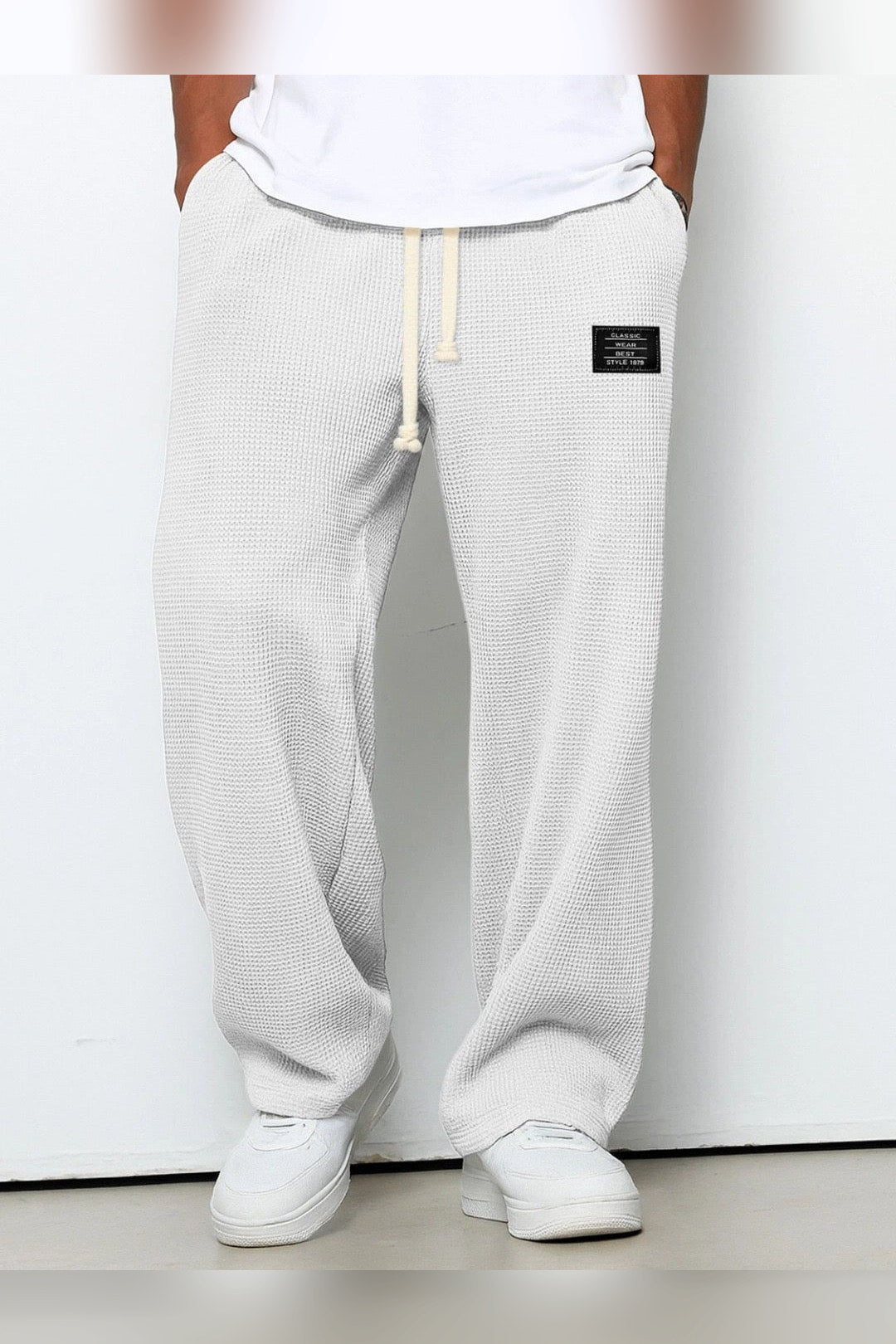 Pantalón de lino de corte relajado en blanco