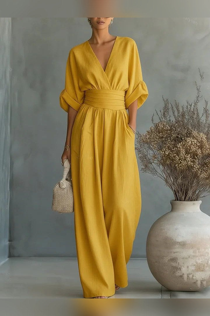 Mono de pernera ancha con fajín en amarillo
