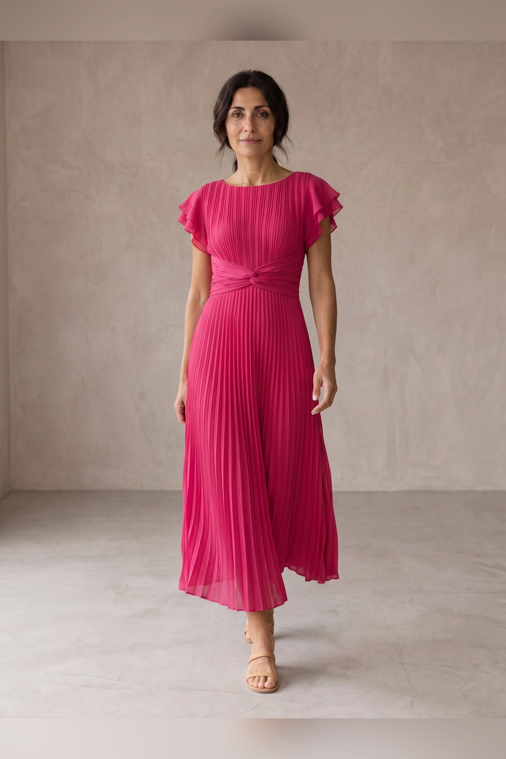 Vestido largo plisado con cintura anudada en rosa