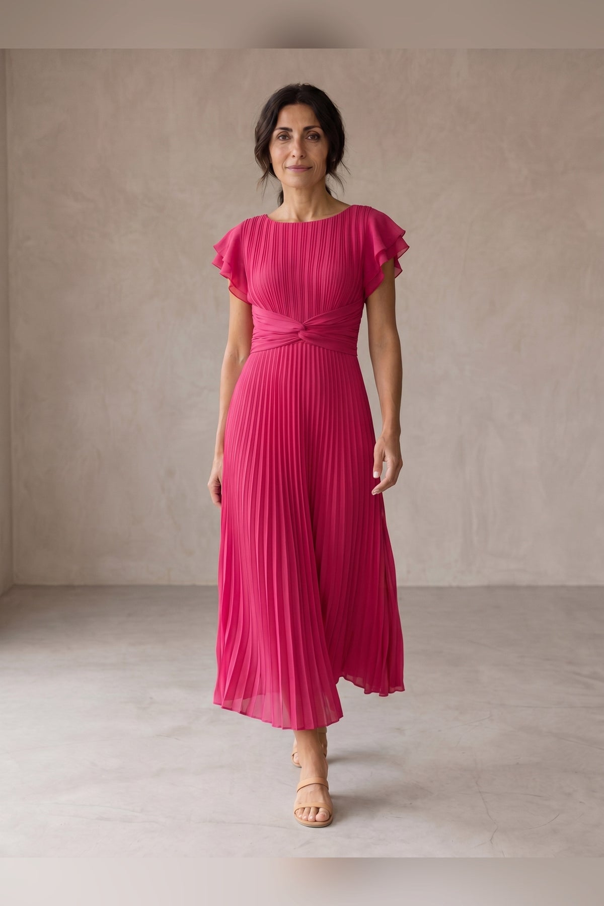 Vestido largo plisado con cintura anudada en rosa