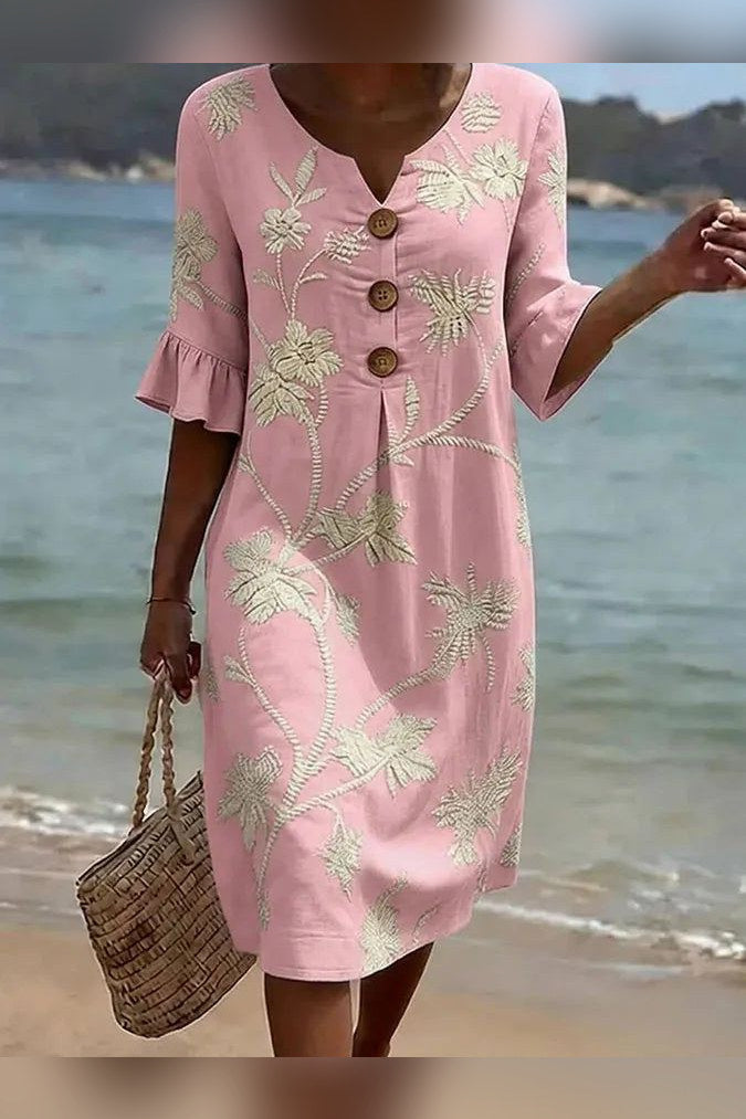 Vestido midi floral con botones de madera en rosa