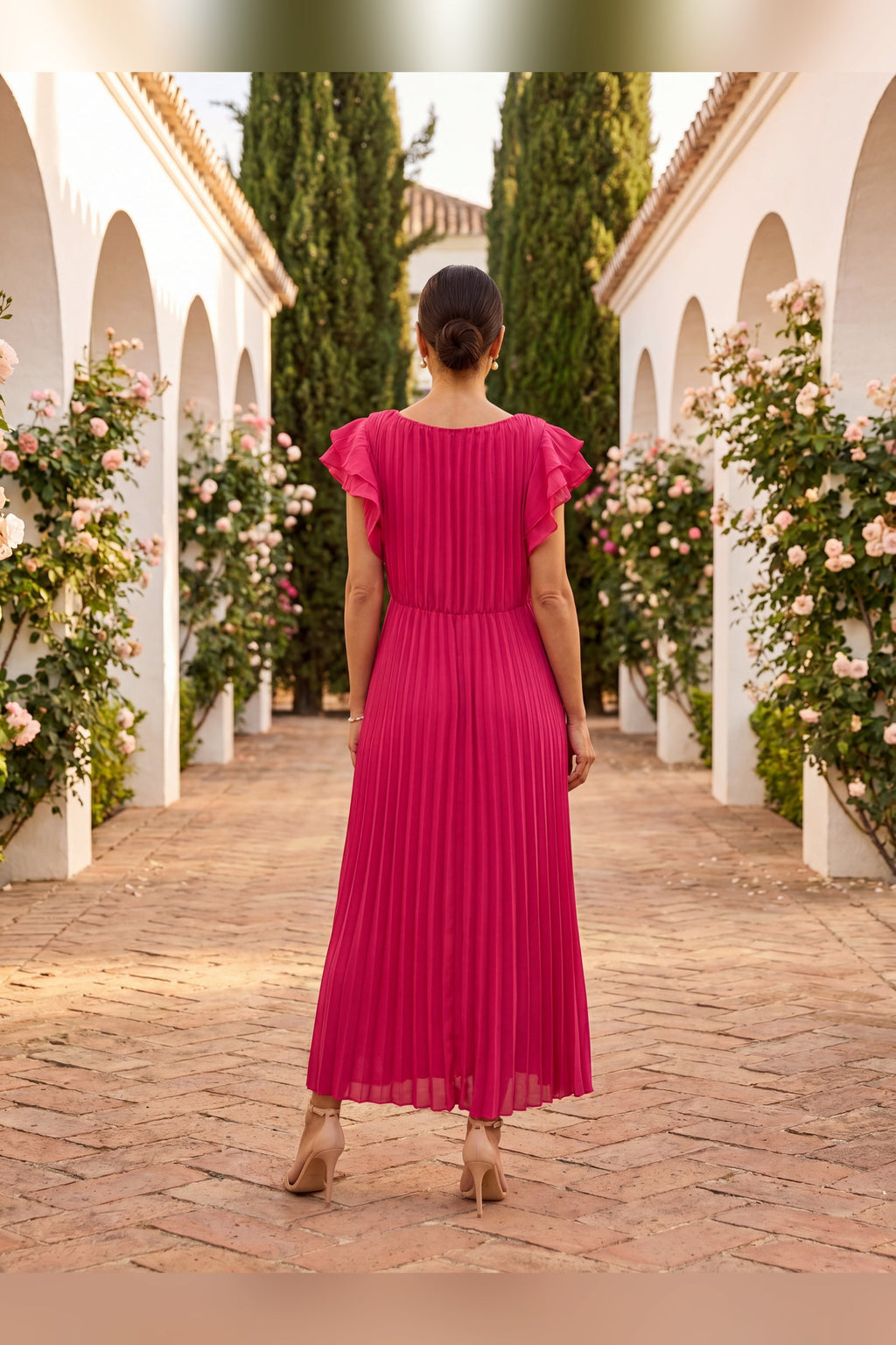 Vestido largo plisado con cintura anudada en rosa