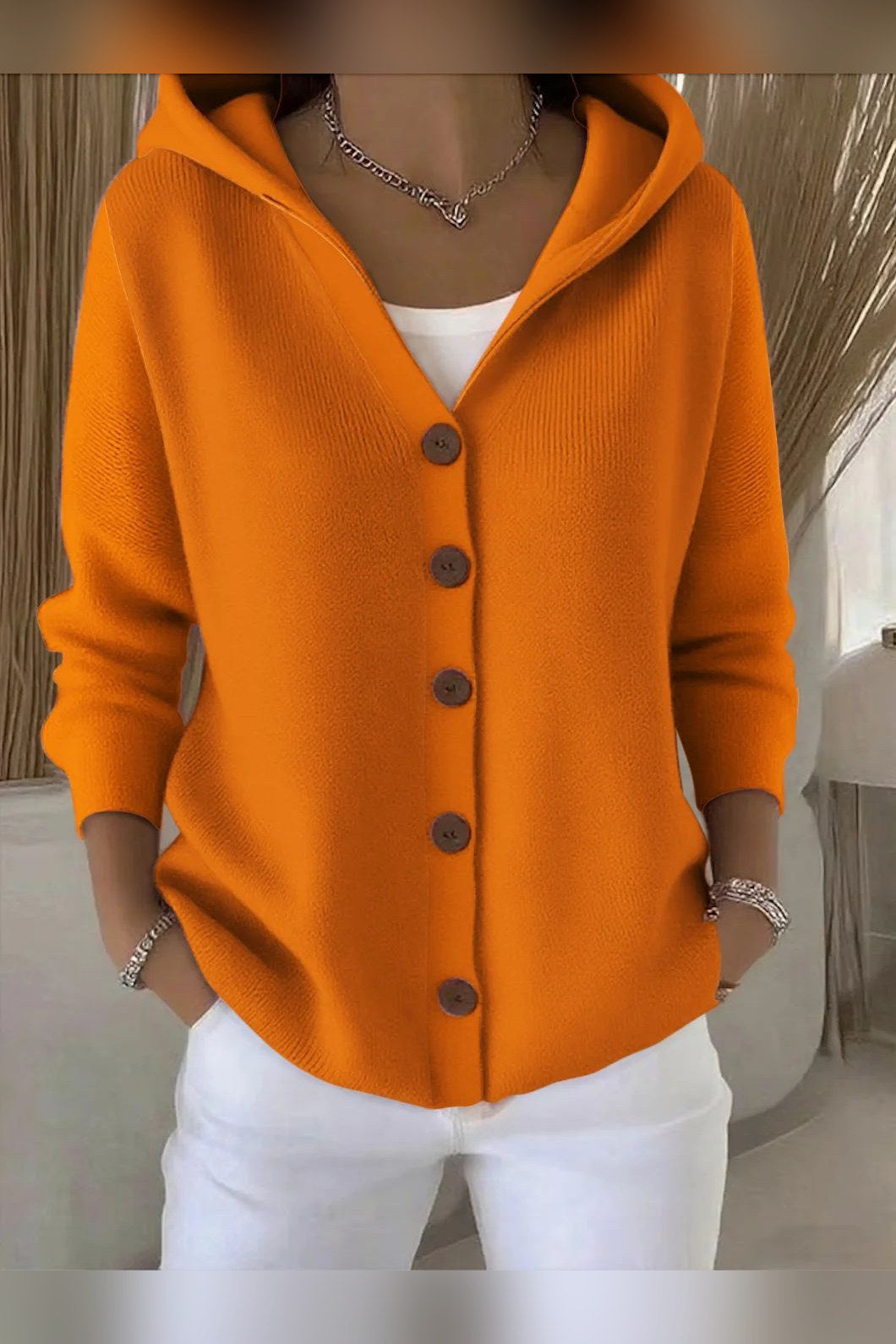 Chaqueta de punto con capucha en naranja