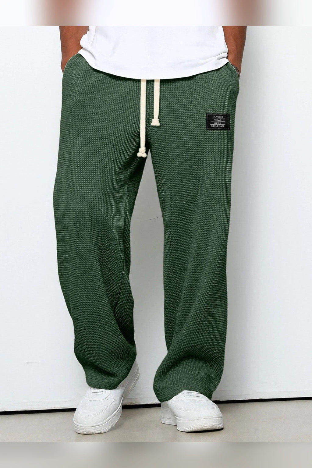 Pantalón de lino de corte relajado en verde oscuro